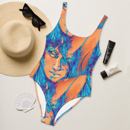 Aiden Orange Blue Goddess One-Piece Swimsuit by Chameleon Surf, featuring a bohemian design with a cheeky fit, scoop neckline, and durable chlorine-resistant fabric, perfect for poolside and beach adventures.