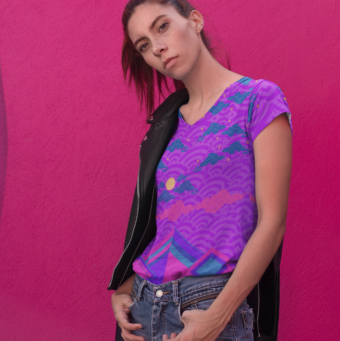 Lady wearing the Chameleon Surf Japan Sky Reflective Mountains Purple Women's T-shirt, featuring a vibrant blend of purples, pinks, and turquoise in a stunning reflective mountain design. This super smooth and comfortable T-shirt, crafted from cotton-touch polyester jersey, offers unmatched comfort and stays fresh after multiple washes. Perfect for any season, this stylish tee captures the essence of both summer and fall.